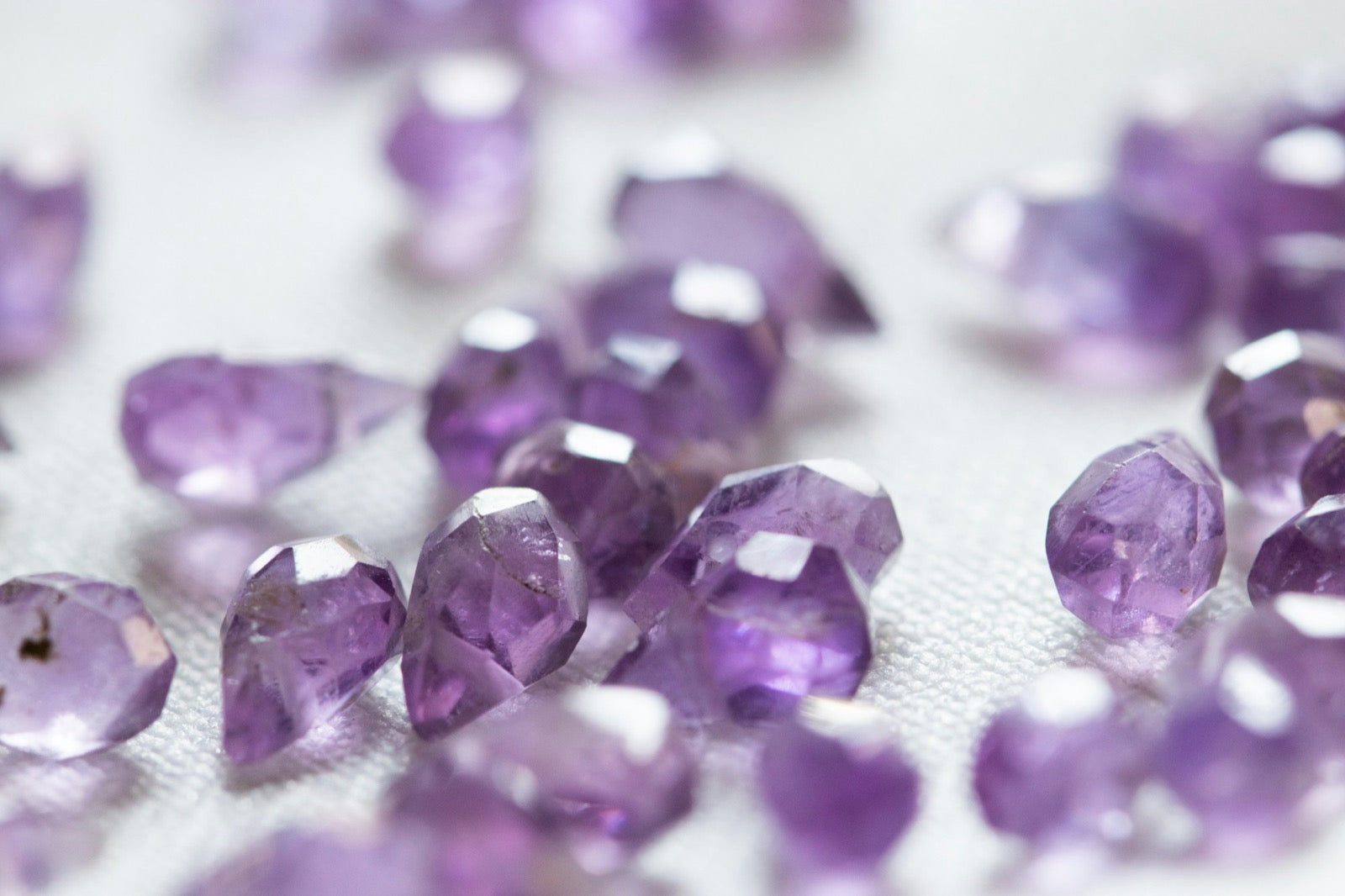 Amethyst preforms on a pale cloth